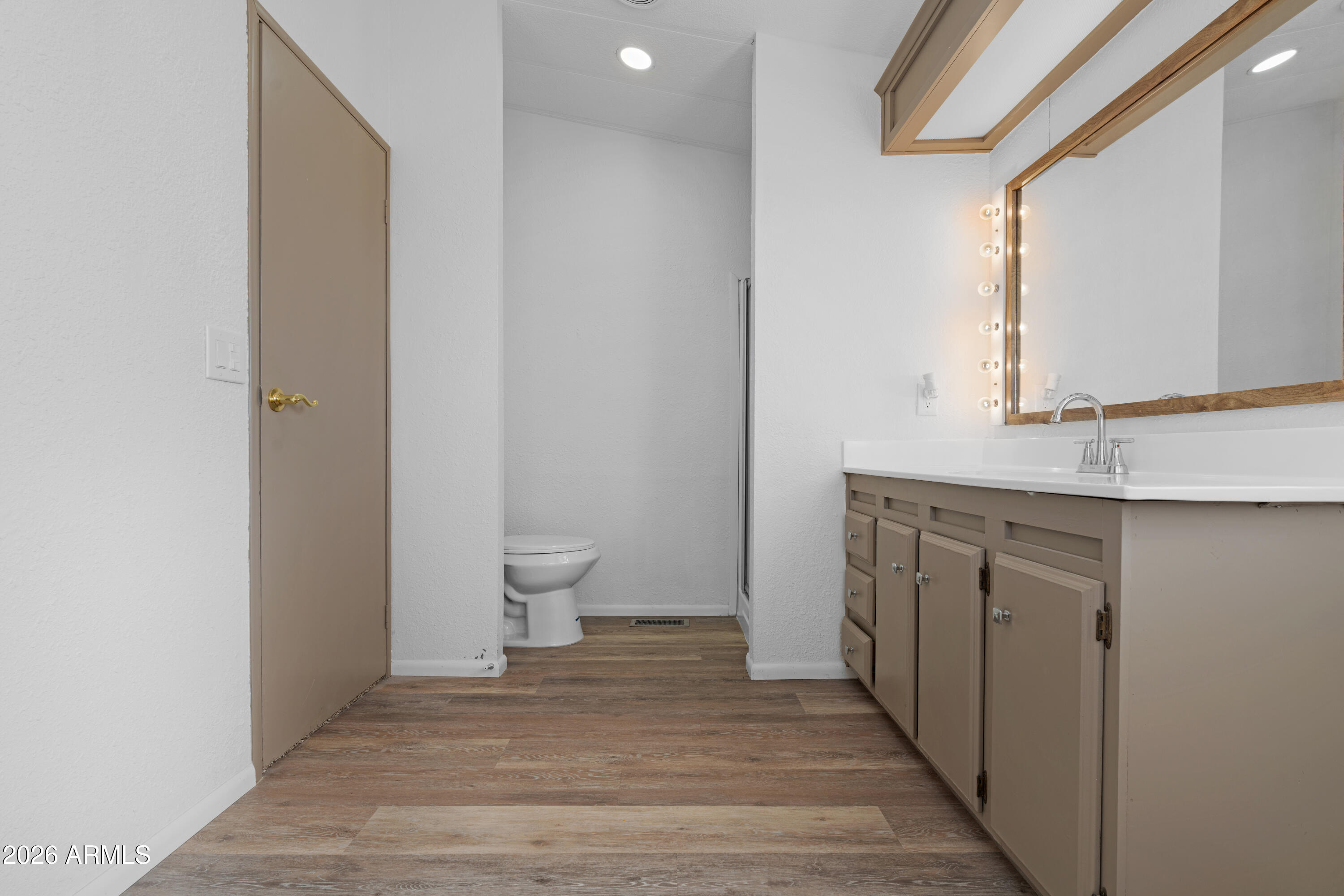 53925 West Stallion Road Maricopa, AZ 85139 - Photo 23 of 46 a bathroom with a sink and a toilet