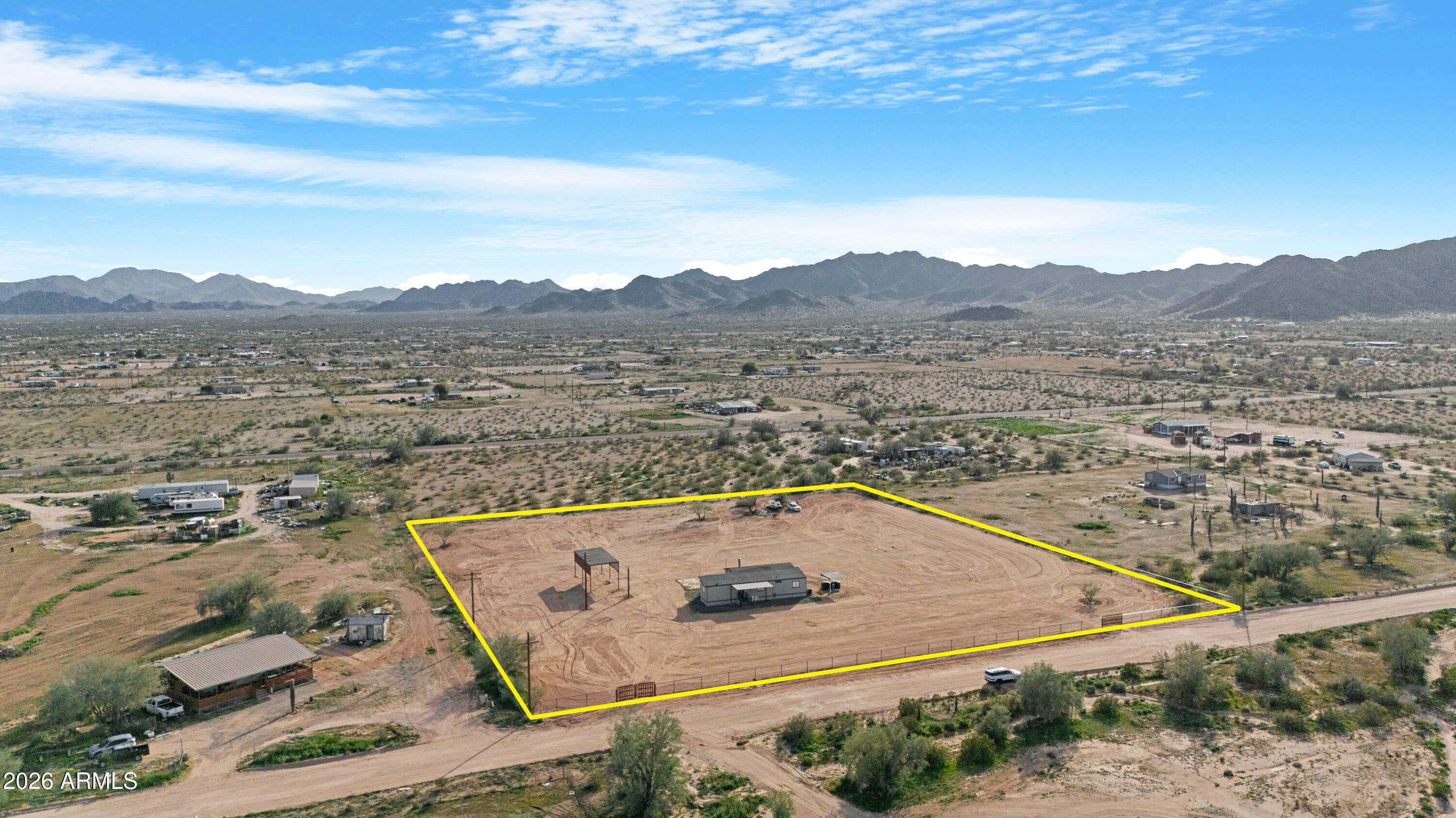 53925 West Stallion Road Maricopa, AZ 85139 - Photo 37 of 46 a view of a pool with a table and chairs