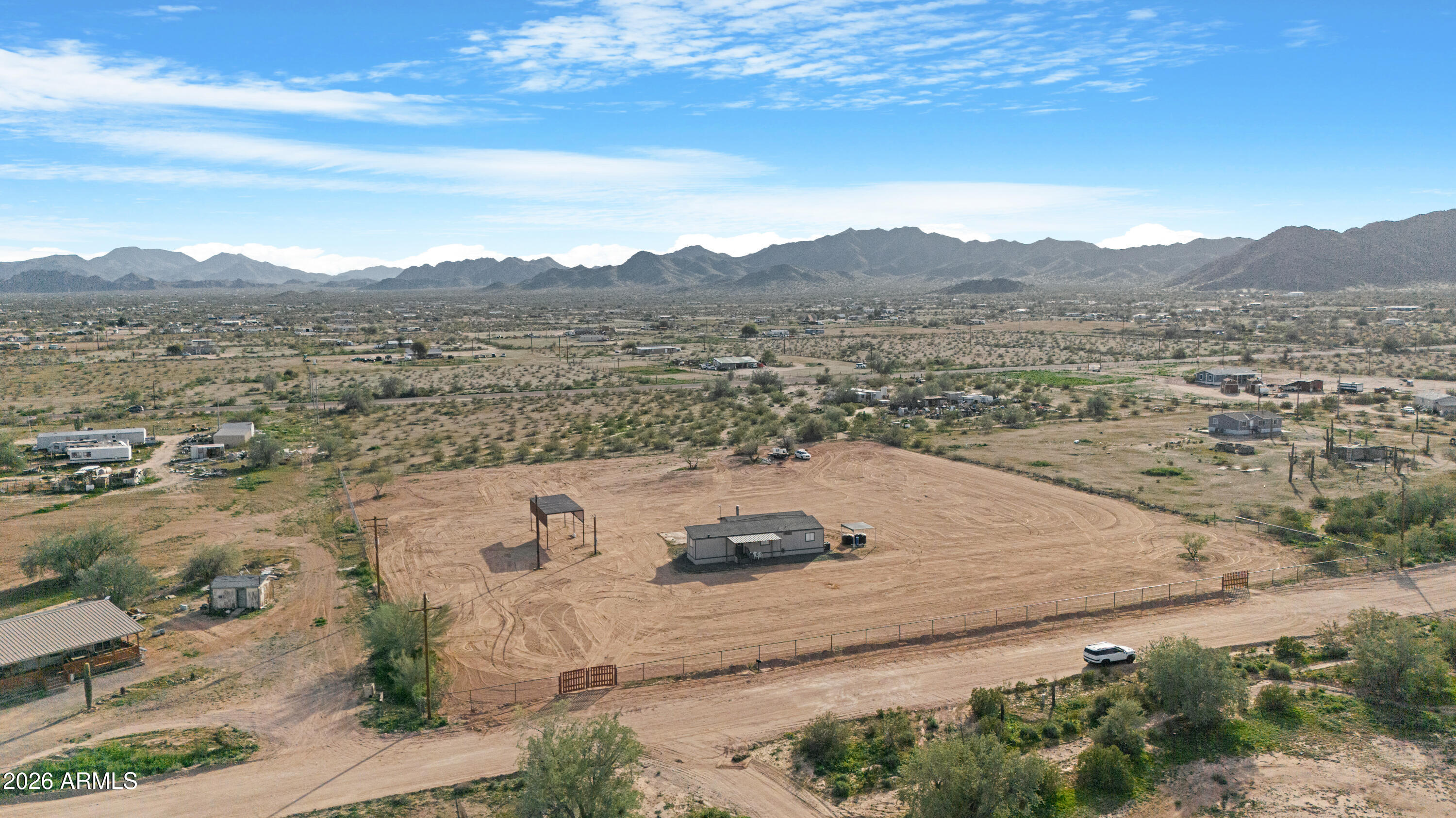53925 West Stallion Road Maricopa, AZ 85139 - Photo 39 of 46 a view of a dry yard with mountains