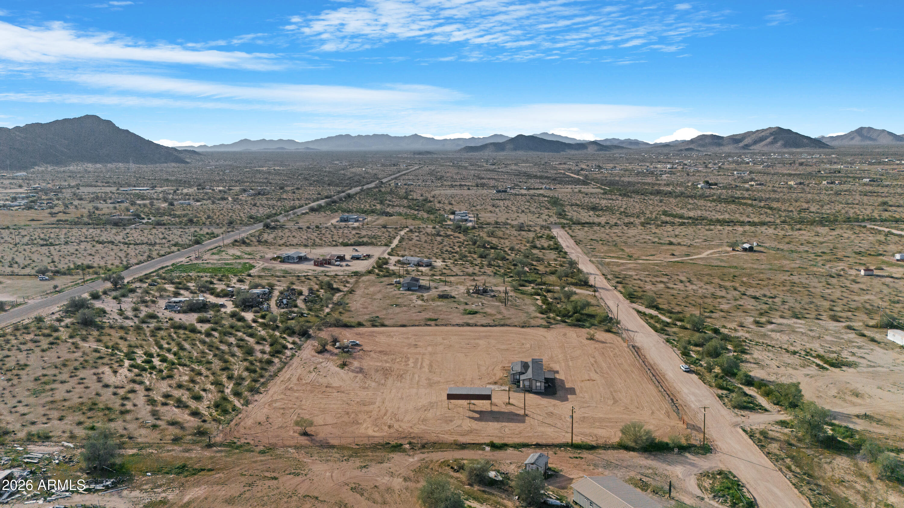 53925 West Stallion Road Maricopa, AZ 85139 - Photo 40 of 46 a view of a house with a mountain