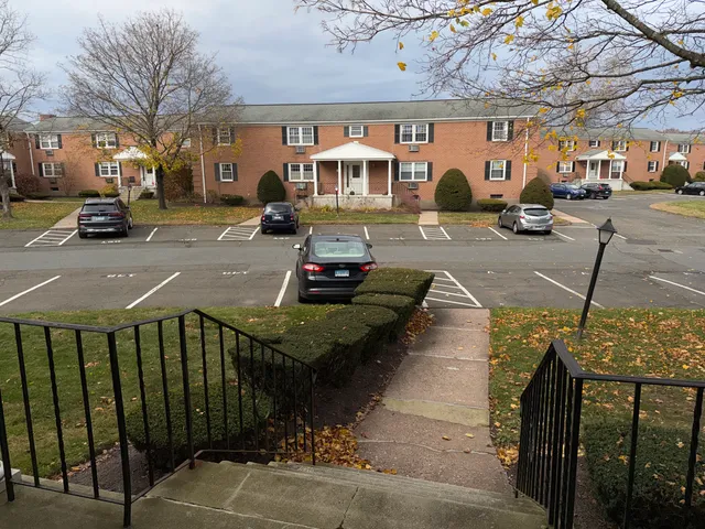 a childrens park with lots of swings and slides