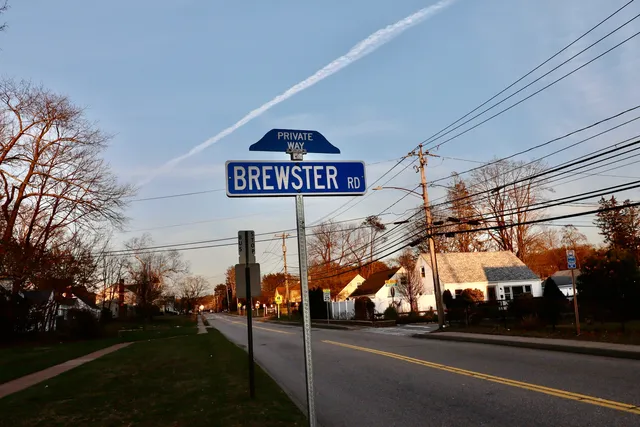 a view of a street with a building