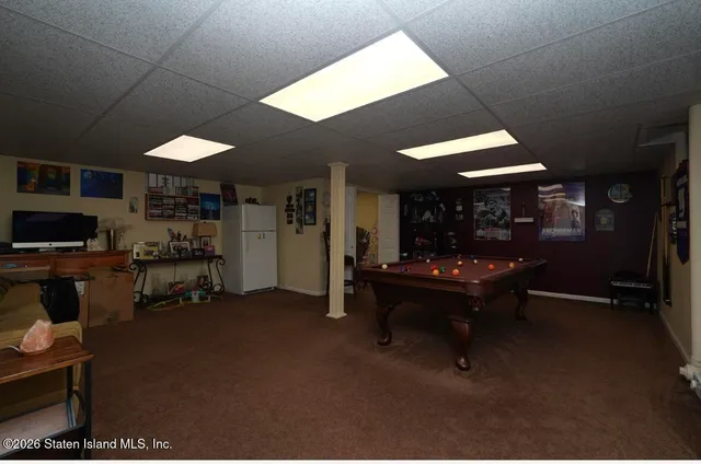 a front view of a house with stairs