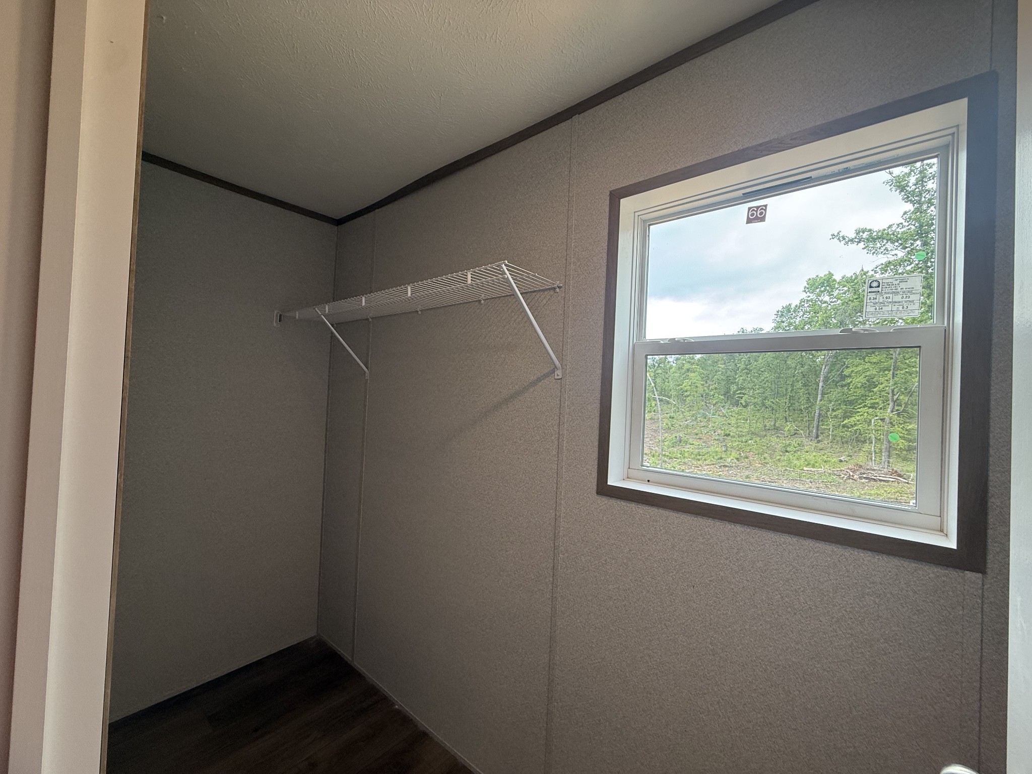467 Woodland Road Hohenwald, TN 38462 - Photo 12 of 20 a view of a small space with wooden floor and a window