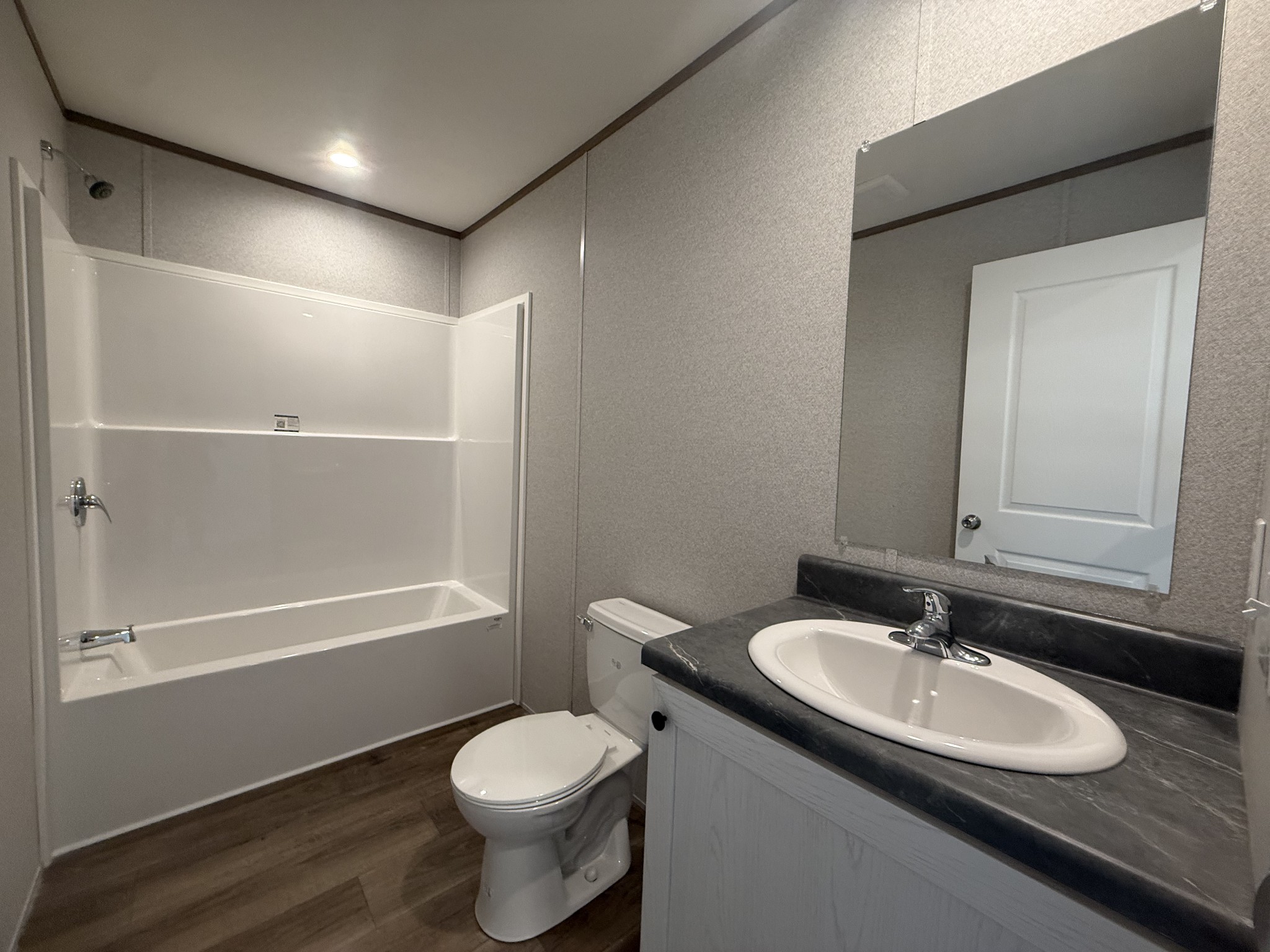 467 Woodland Road Hohenwald, TN 38462 - Photo 16 of 20 a bathroom with a sink toilet and shower