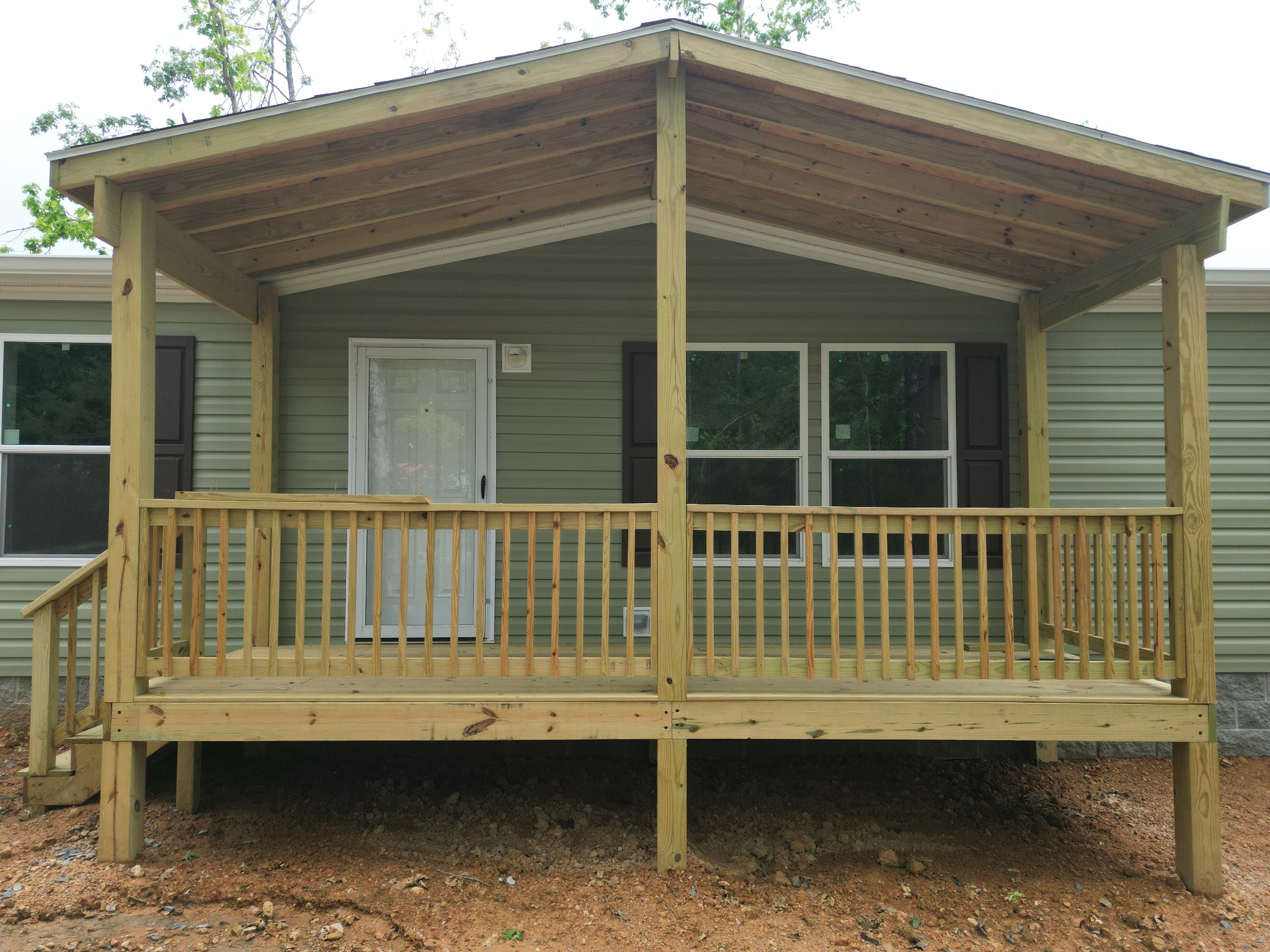 467 Woodland Road Hohenwald, TN 38462 - Photo 2 of 20 a view of a small house with a window