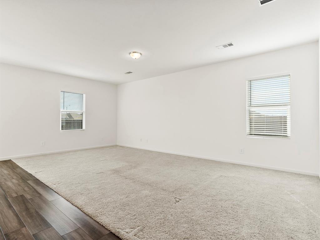 13344 Ridings Drive Fort Worth, TX 76052 - Photo 17 of 29 an empty room with windows