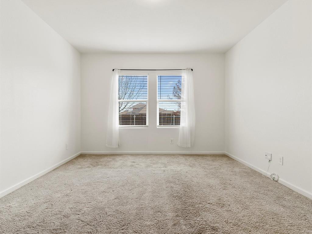 13344 Ridings Drive Fort Worth, TX 76052 - Photo 22 of 29 an empty room with a window