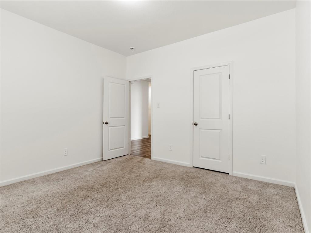 13344 Ridings Drive Fort Worth, TX 76052 - Photo 7 of 29 an empty room with an entryway