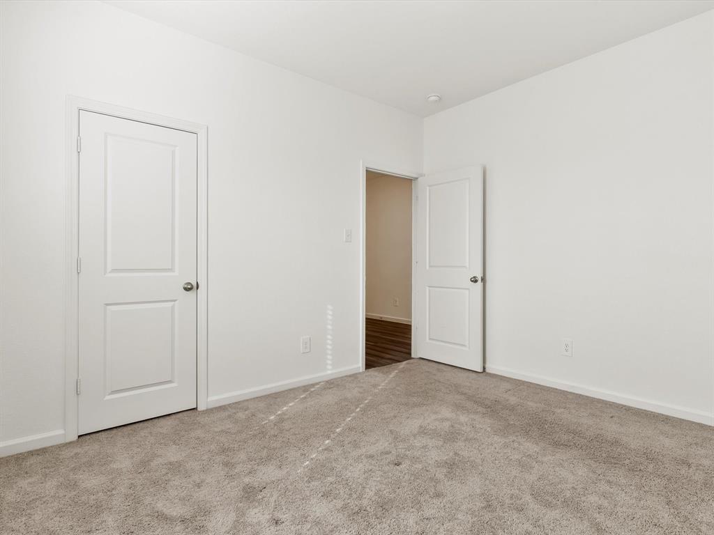 13344 Ridings Drive Fort Worth, TX 76052 - Photo 10 of 29 an empty room with an entryway