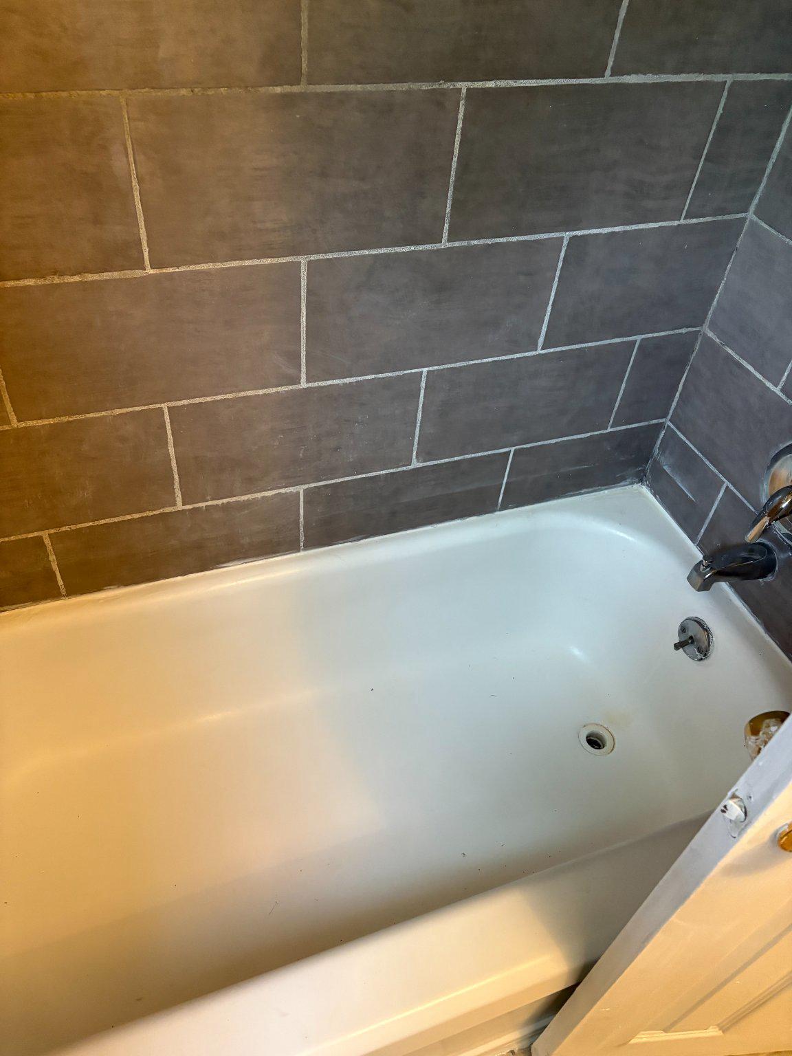 3419 Carter Lane Chester, PA 19013 - Photo 24 of 52 Unit 1 - 2nd Floor Modern tub with tile backdrop.