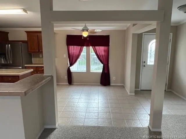 a view of kitchen and a window