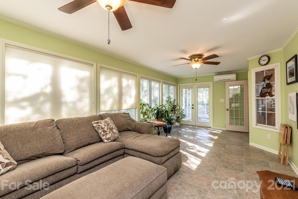 1002 4th Street Northeast Conover, NC 28613 - Photo 15 of 41 a living room with furniture and a large window