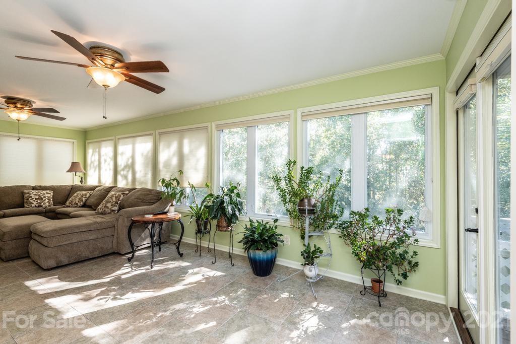 1002 4th Street Northeast Conover, NC 28613 - Photo 16 of 41 a living room with furniture and a large window