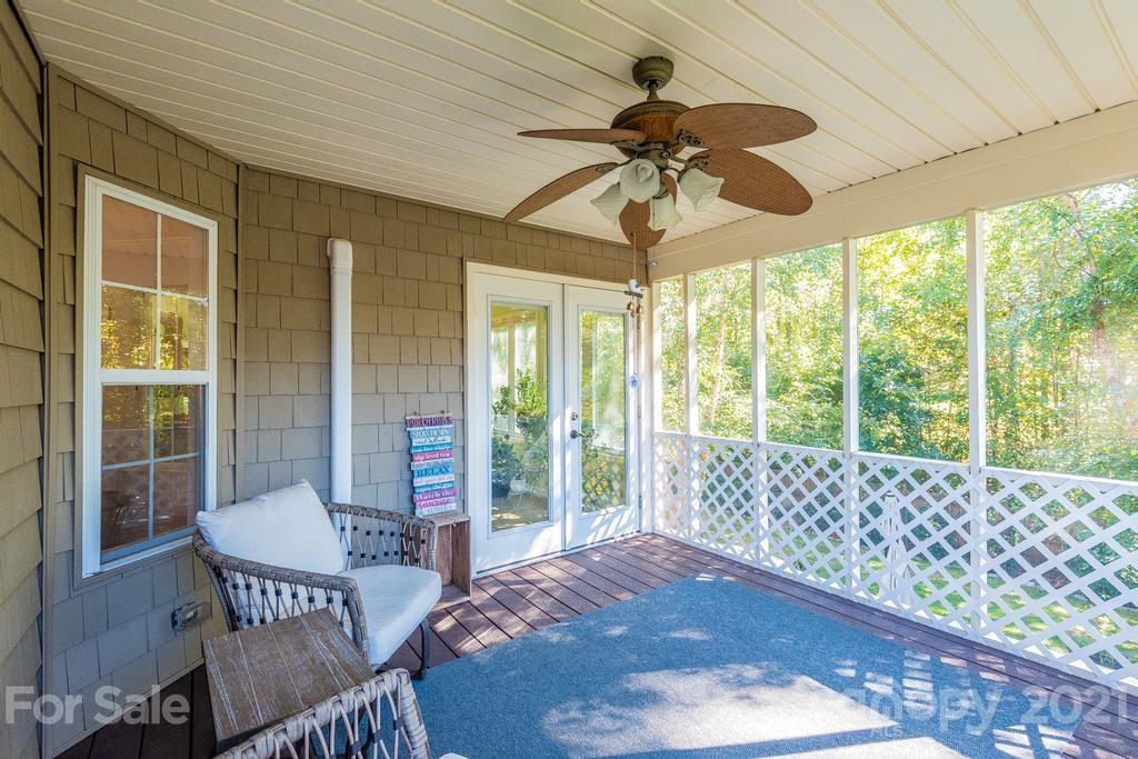 1002 4th Street Northeast Conover, NC 28613 - Photo 18 of 41 a living room with furniture and a large window