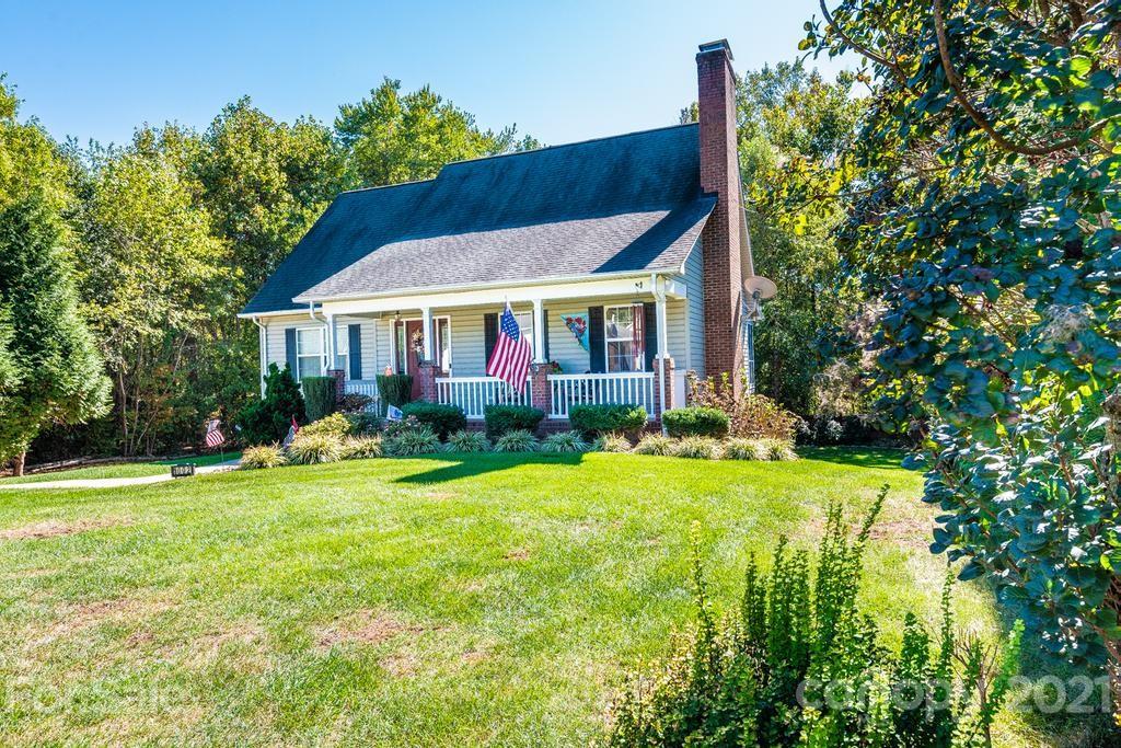 1002 4th Street Northeast Conover, NC 28613 - Photo 3 of 41 a view of a house with backyard and garden