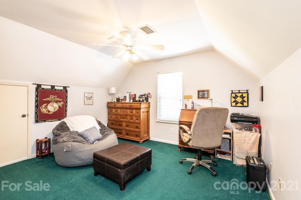 1002 4th Street Northeast Conover, NC 28613 - Photo 24 of 41 a living room with furniture and a couch