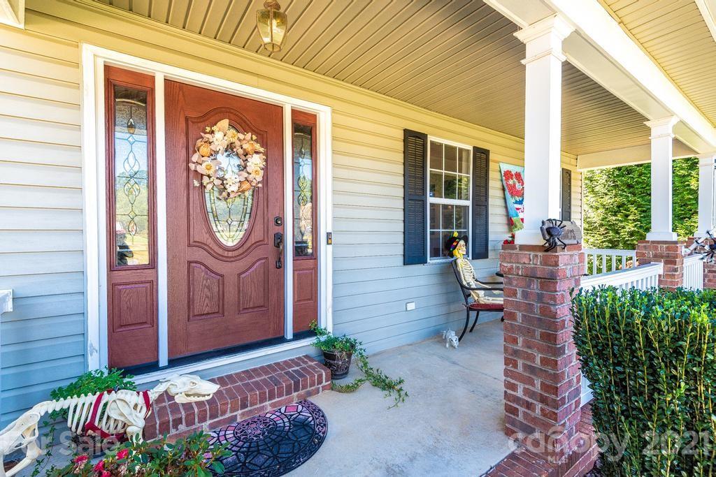 1002 4th Street Northeast Conover, NC 28613 - Photo 4 of 41 a view of a two chairs with the front door