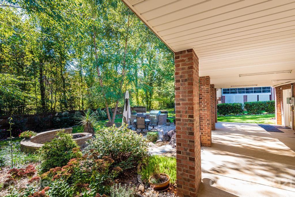 1002 4th Street Northeast Conover, NC 28613 - Photo 37 of 41 a backyard of a house with lots of green space