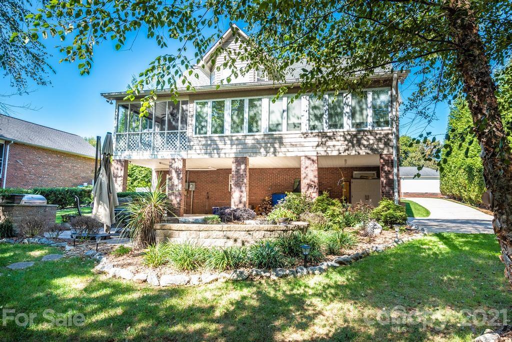 1002 4th Street Northeast Conover, NC 28613 - Photo 39 of 41 a view of a house with a garden and balcony