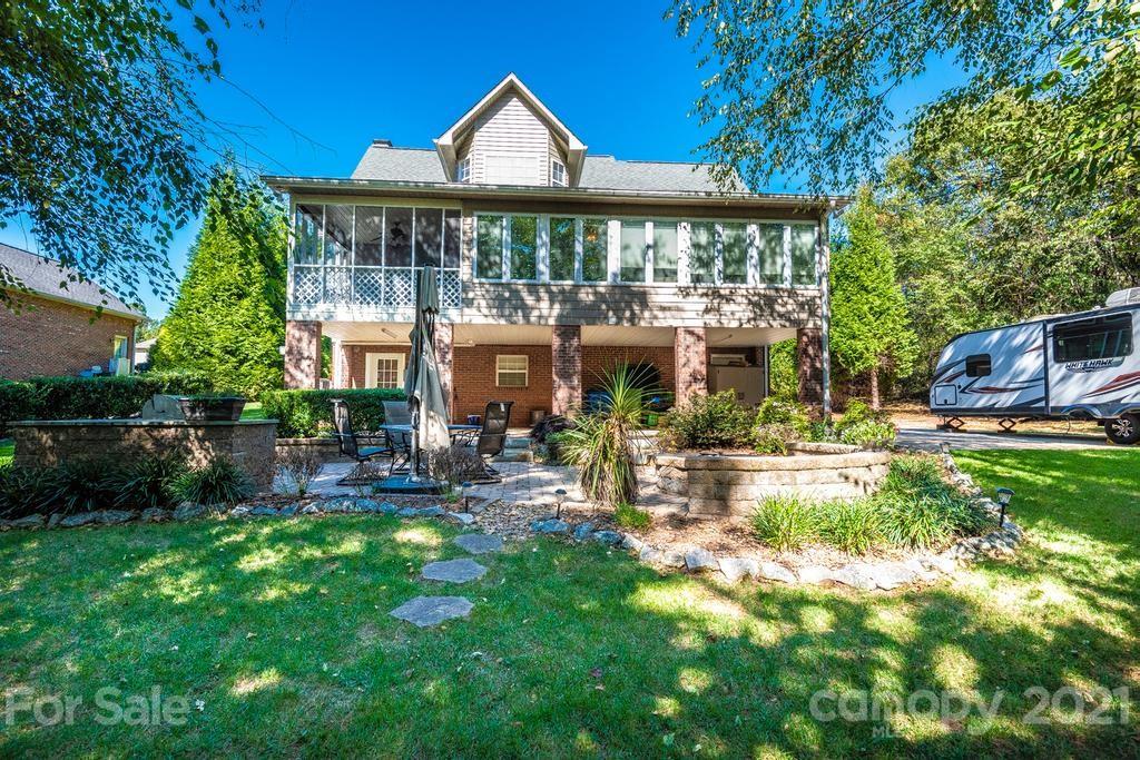 1002 4th Street Northeast Conover, NC 28613 - Photo 40 of 41 a front view of a house with garden and patio