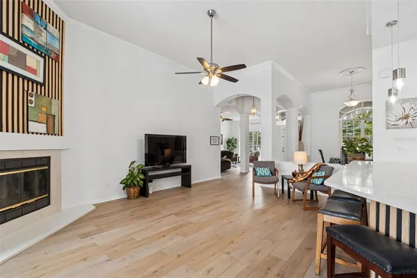 a view of a dining room with furniture window and wooden floor
