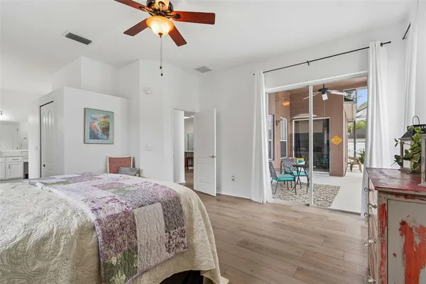 a bathroom with a tub sink shower and mirror
