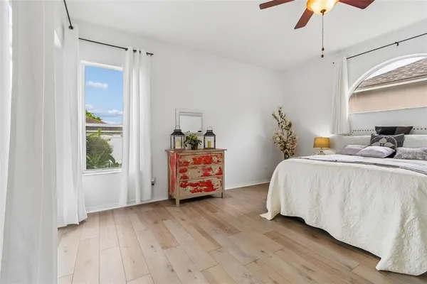 a bathroom with a tub and shower