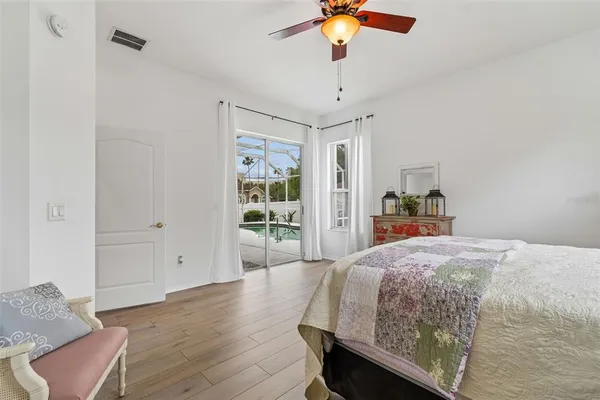 a en suite bathroom with a sink a mirror and a shower