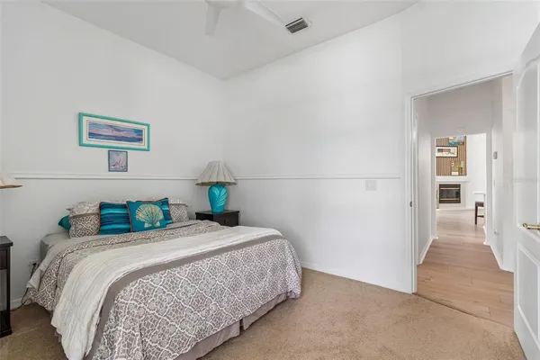 a bathroom with a double vanity sink toilet and shower