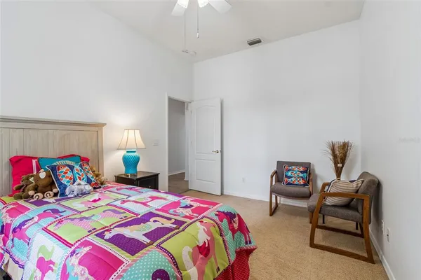 a view of a chairs and table in a patio