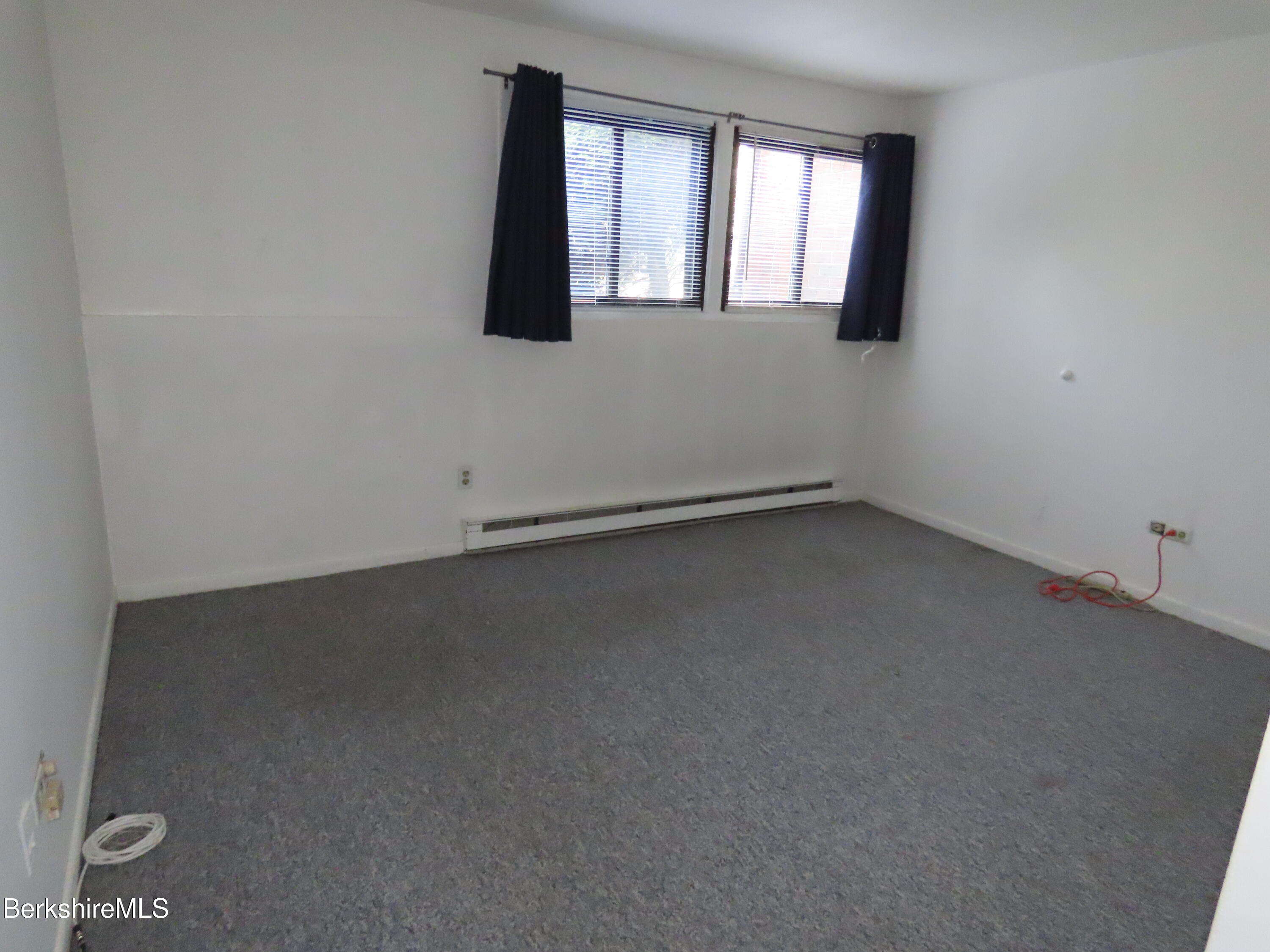 189 Stratton Road, Unit C4 Williamstown, MA 01267 - Photo 18 of 28 an empty room with a window