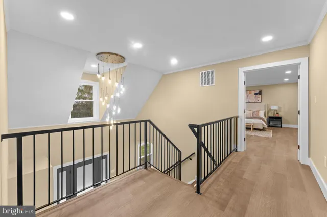 a view of a hallway with a livingroom