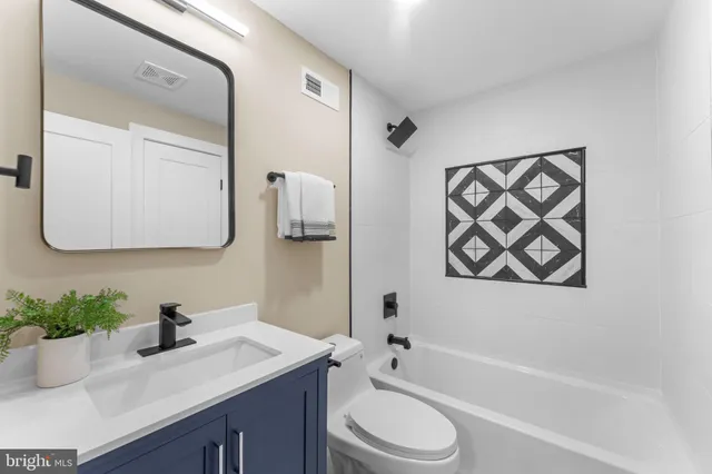 a front view of house with yard and seating area