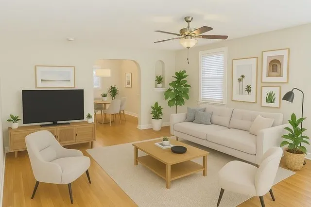 a living room with furniture a large window and a flat screen tv