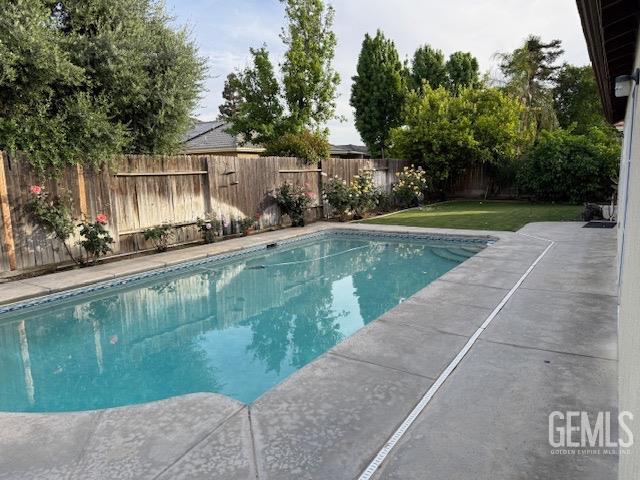 Undisclosed Address Bakersfield, CA 93311 - Photo 6 of 16 a view of a house with a yard