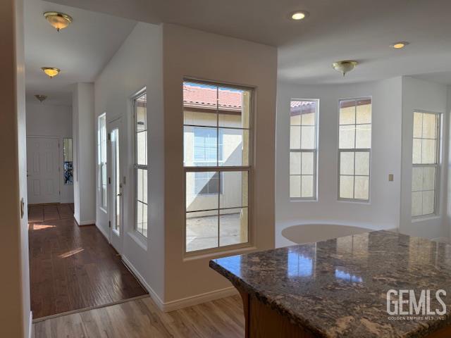 Undisclosed Address Bakersfield, CA 93311 - Photo 9 of 16 a dining room with a table and chairs
