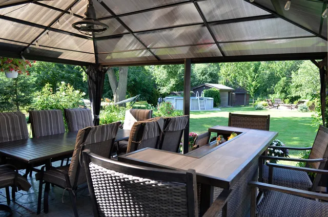 a backyard of a house with lots of green space