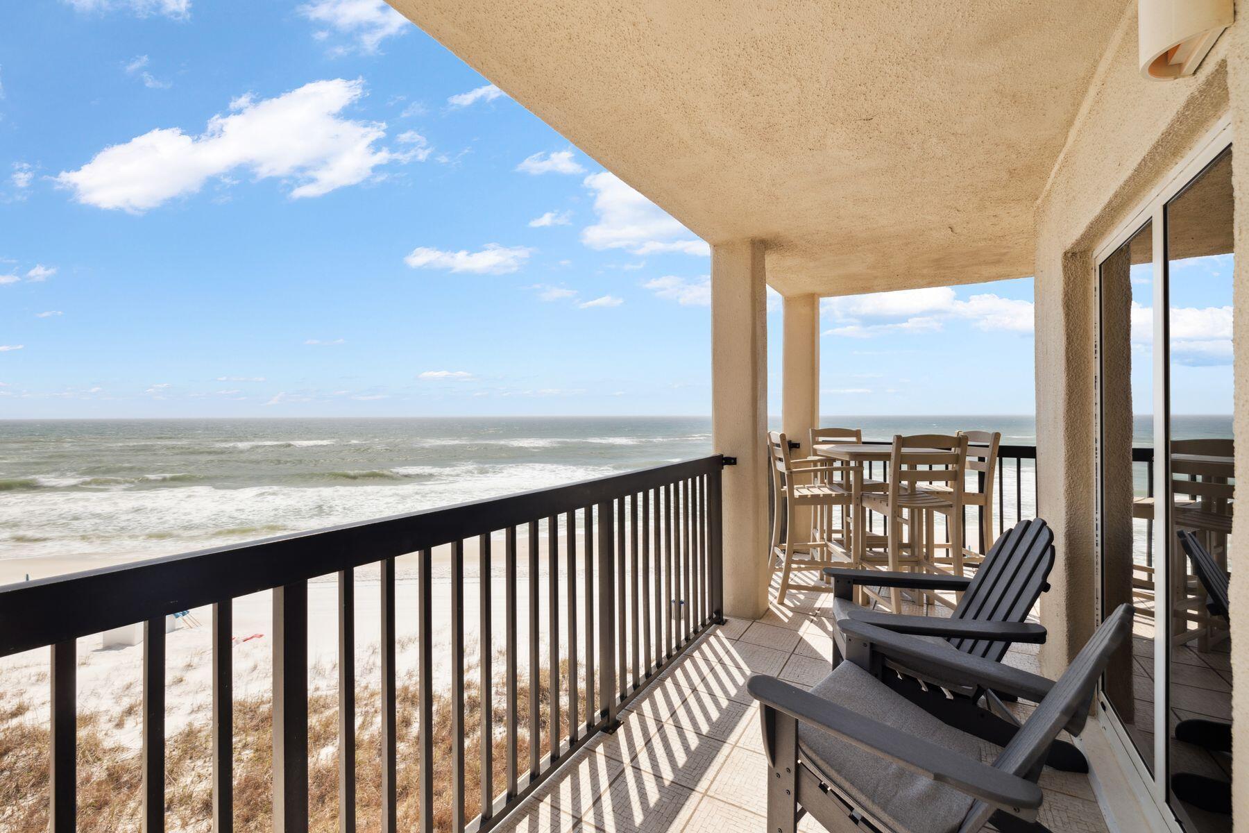 23223 Front Beach Road, Unit B2405 Panama City Beach, FL 32413 - Photo 2 of 28 a view of a balcony with lake view and a ocean view