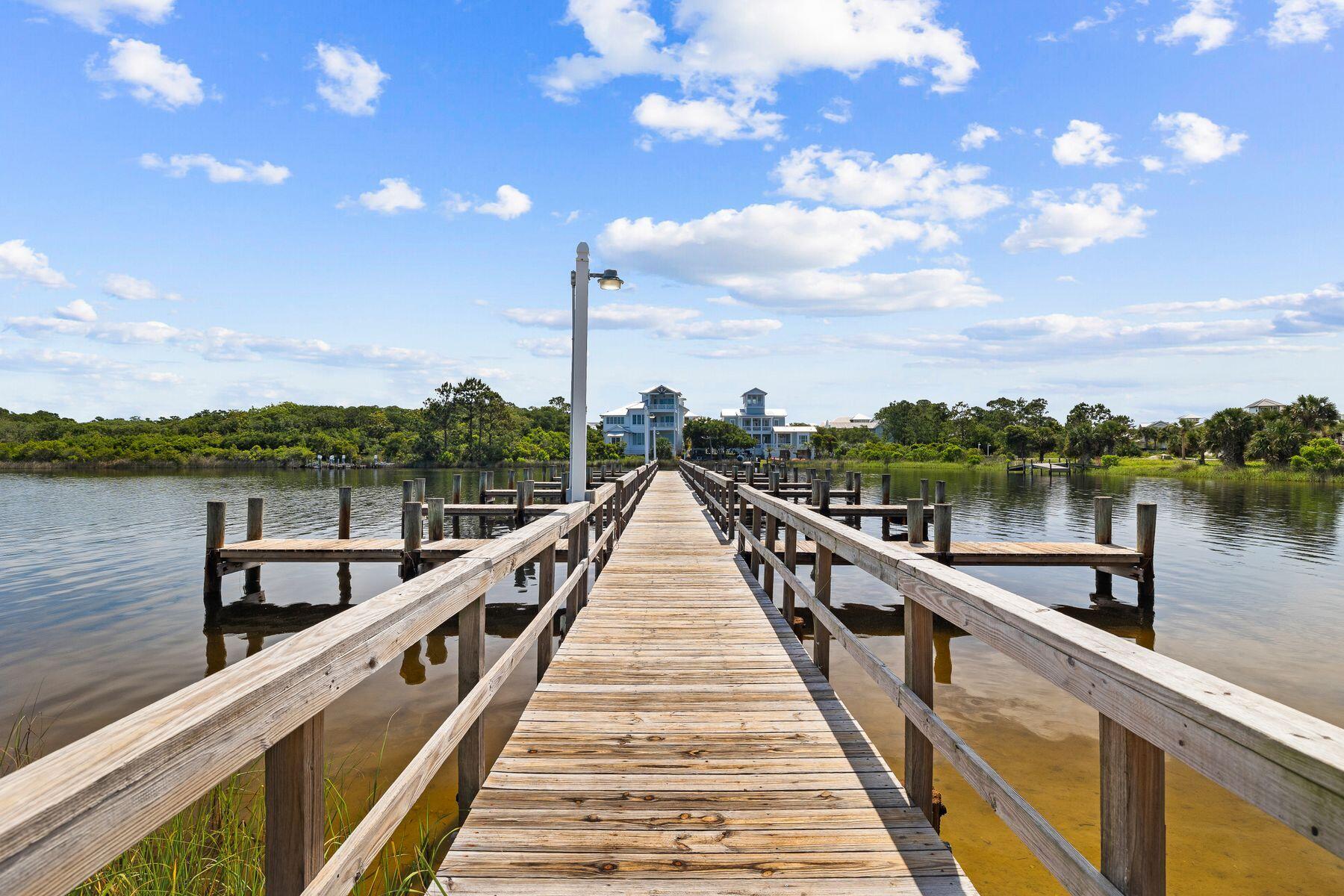 23223 Front Beach Road, Unit B2405 Panama City Beach, FL 32413 - Photo 26 of 28 a view of building and lake