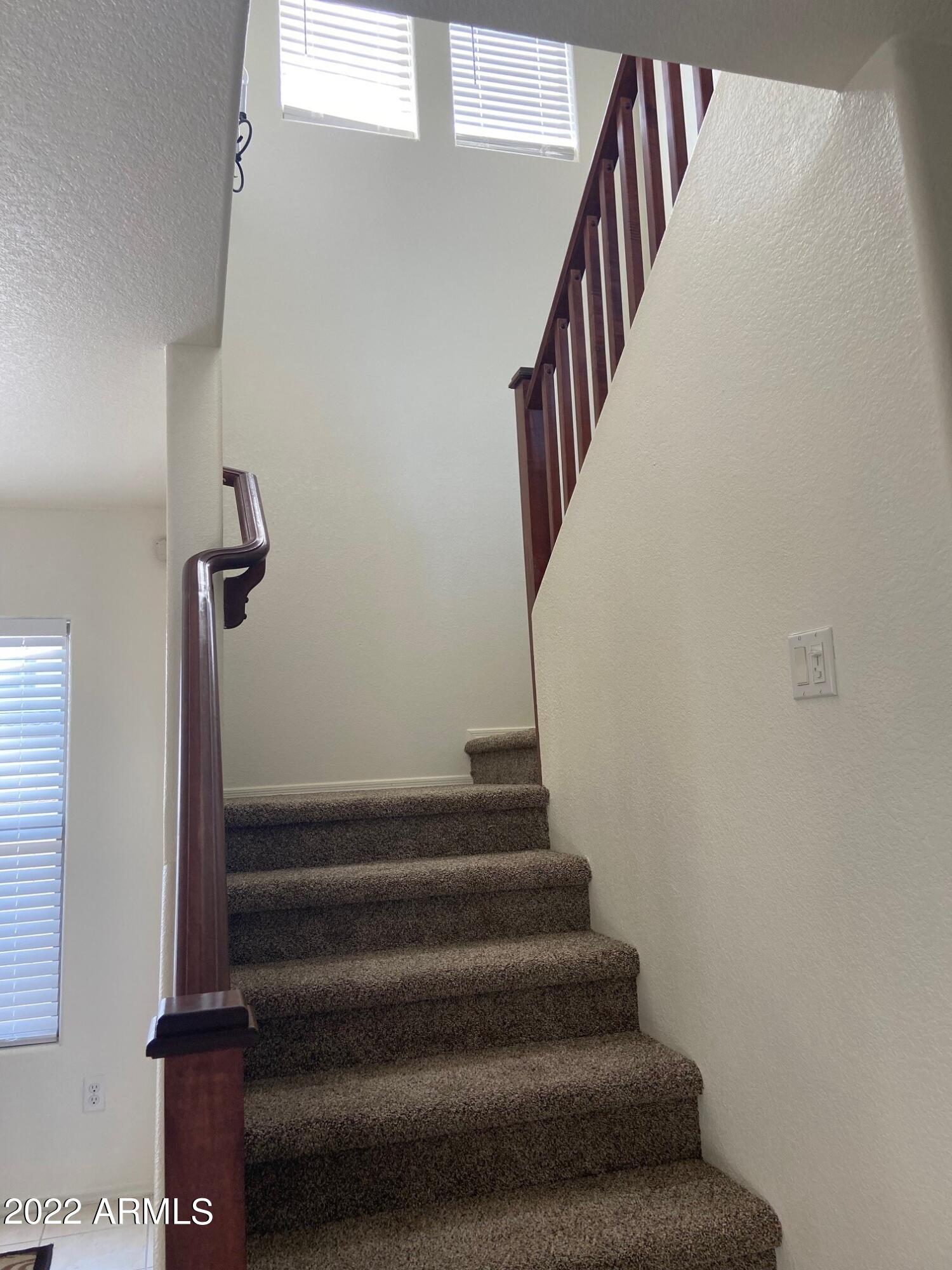 6449 West Constance Way Laveen, AZ 85339 - Photo 14 of 33 stairs with windows