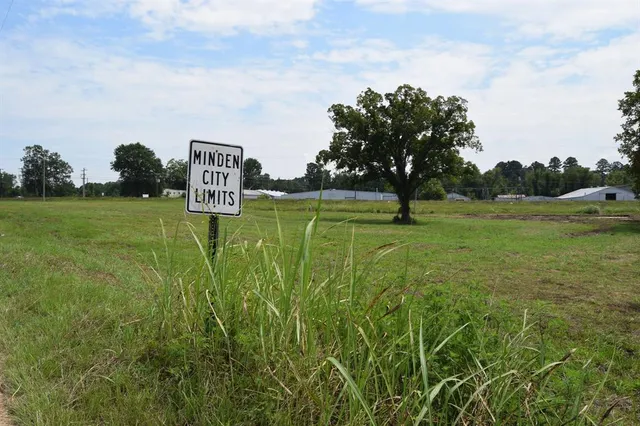 a view of a golf course with a lake