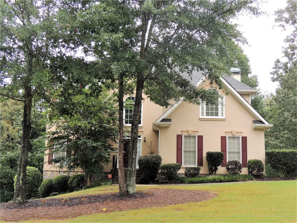 a front view of house with yard