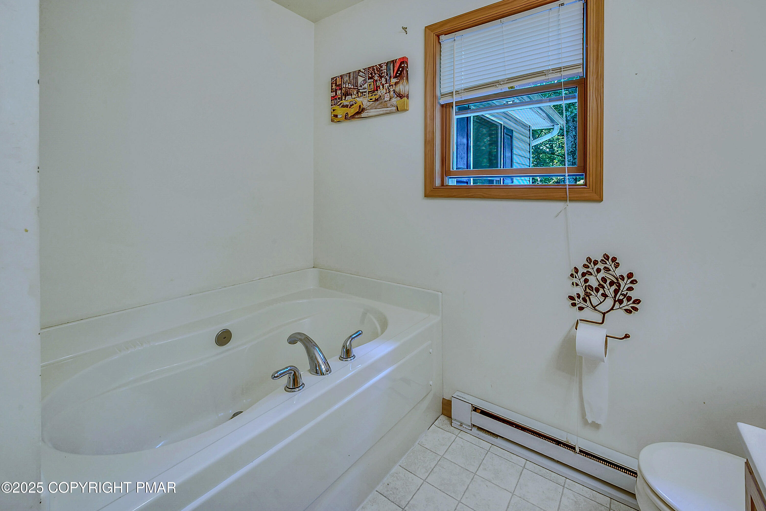 164 Bellingham Drive Bushkill, PA 18324 - Photo 21 of 46 a bathroom with a bathtub and a shower