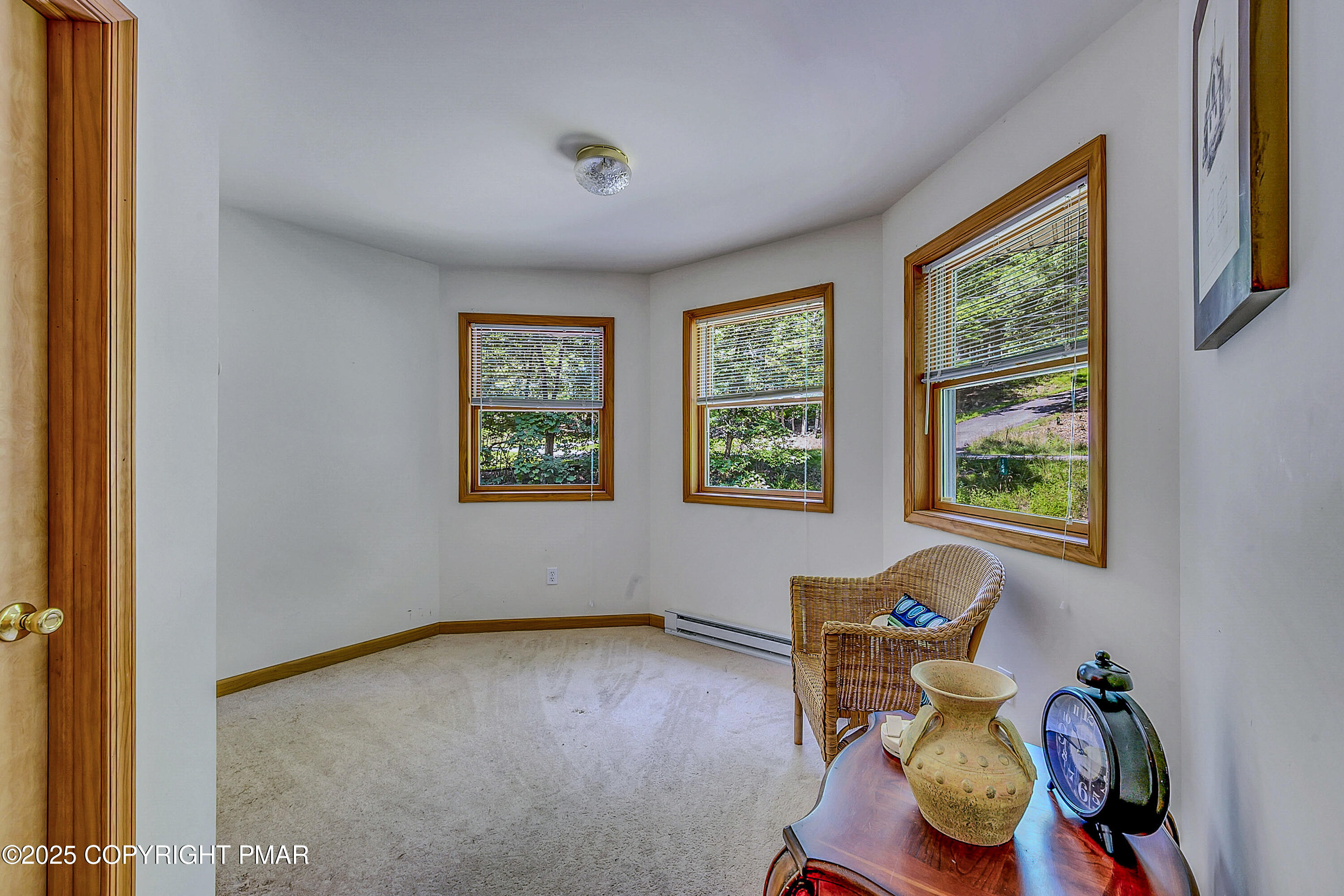 164 Bellingham Drive Bushkill, PA 18324 - Photo 23 of 46 a living room with furniture and a window