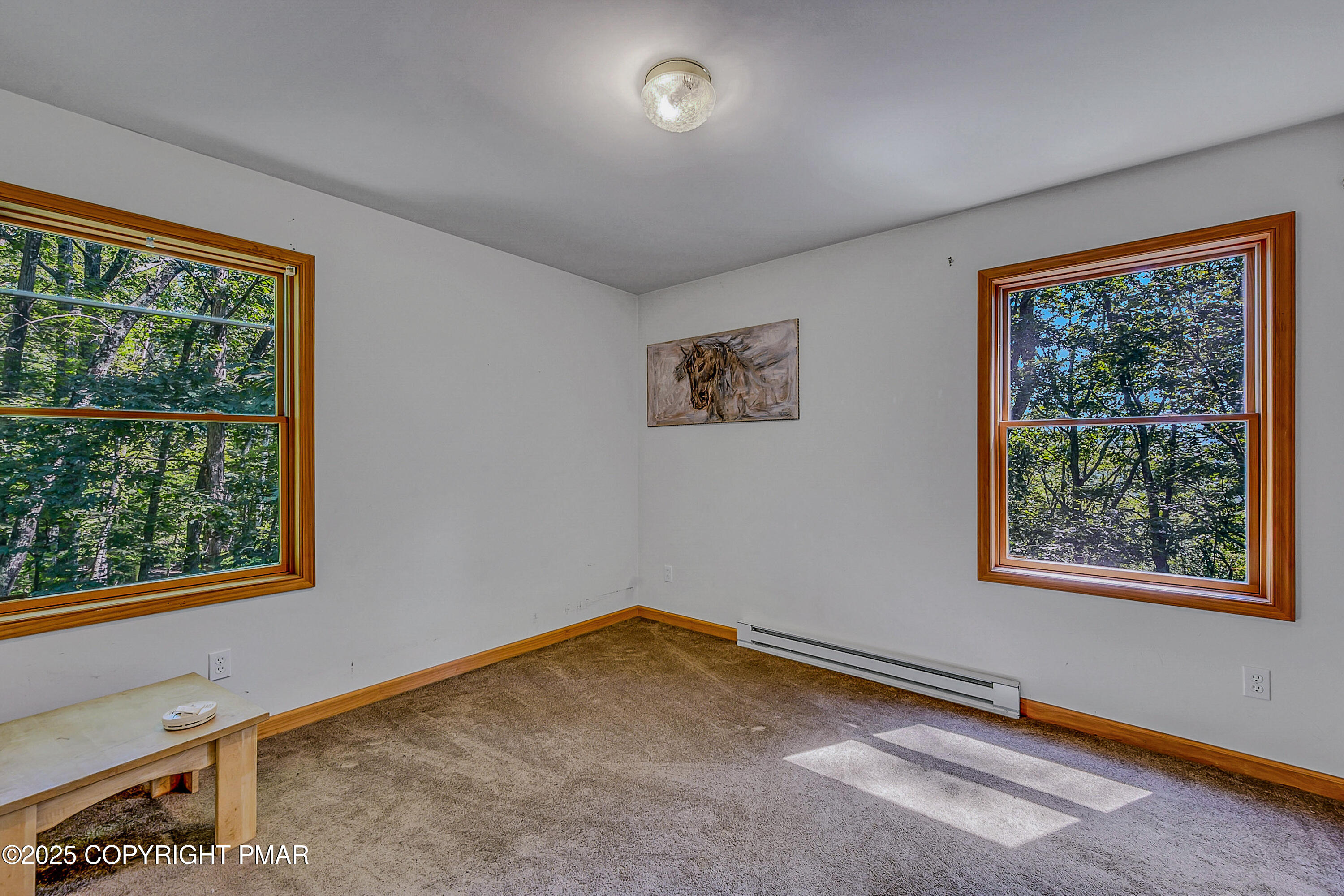 164 Bellingham Drive Bushkill, PA 18324 - Photo 27 of 46 a view of an empty room with a window