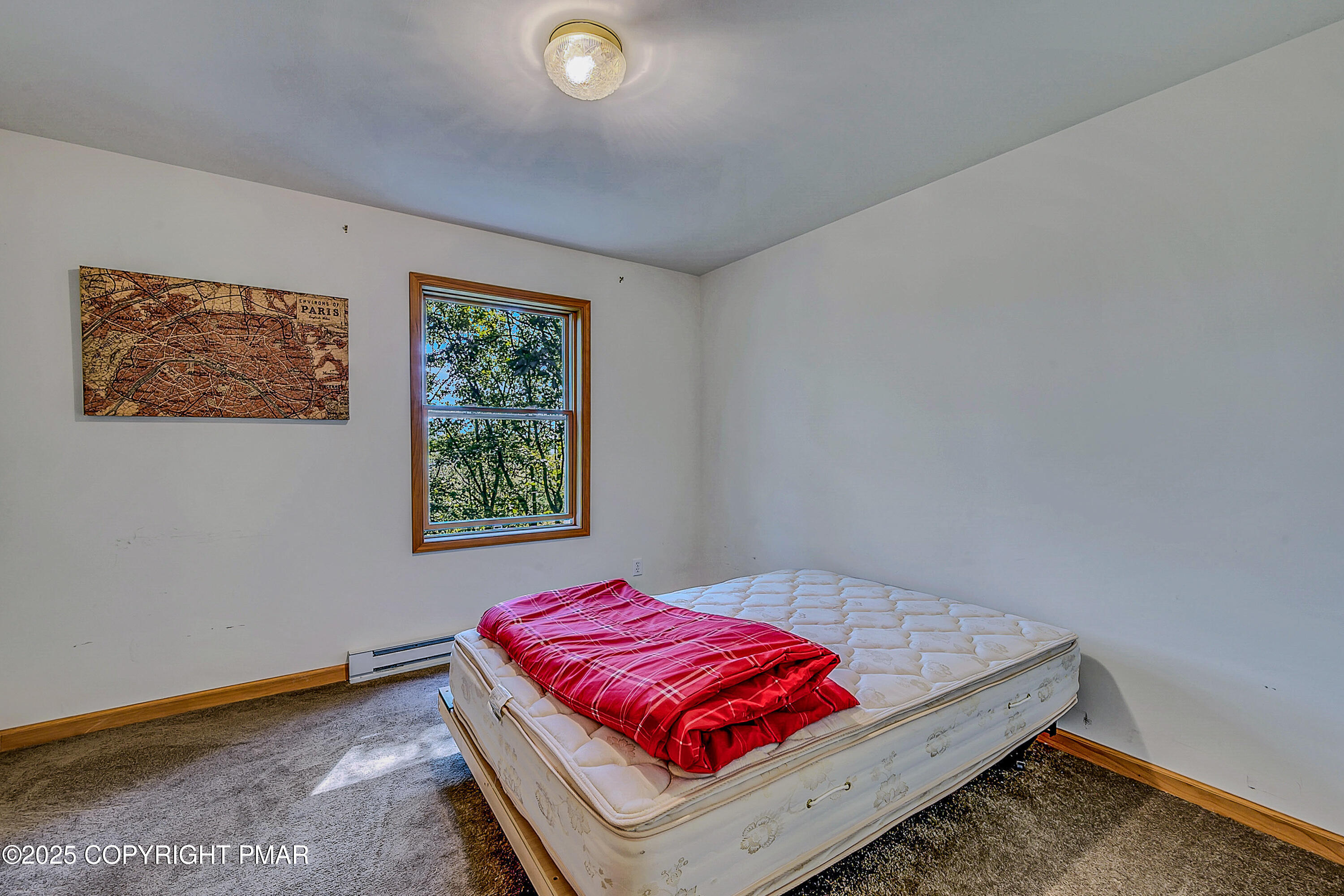 164 Bellingham Drive Bushkill, PA 18324 - Photo 30 of 46 a bedroom with a bed and a window