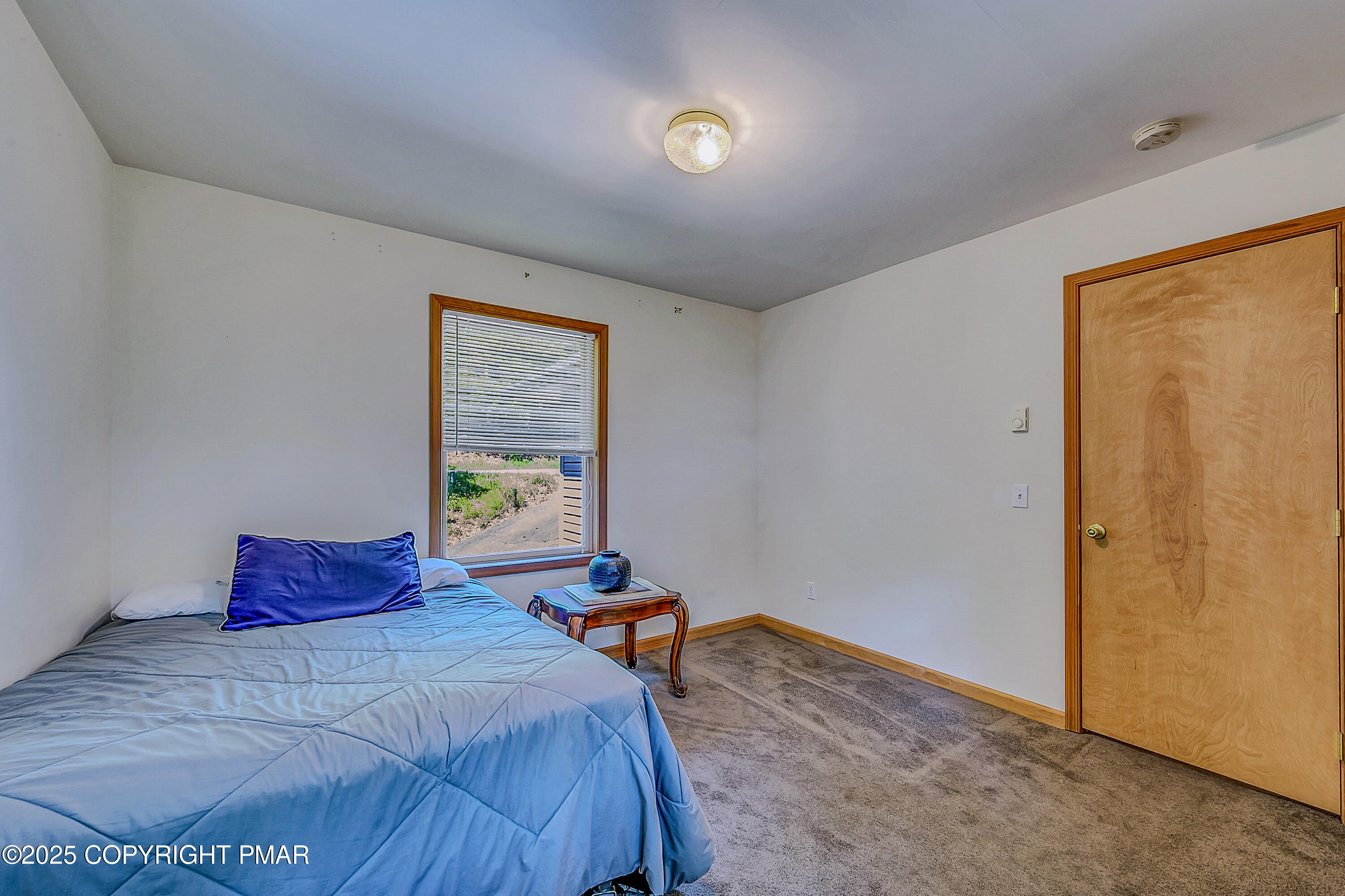 164 Bellingham Drive Bushkill, PA 18324 - Photo 37 of 46 a bedroom with a bed and a window