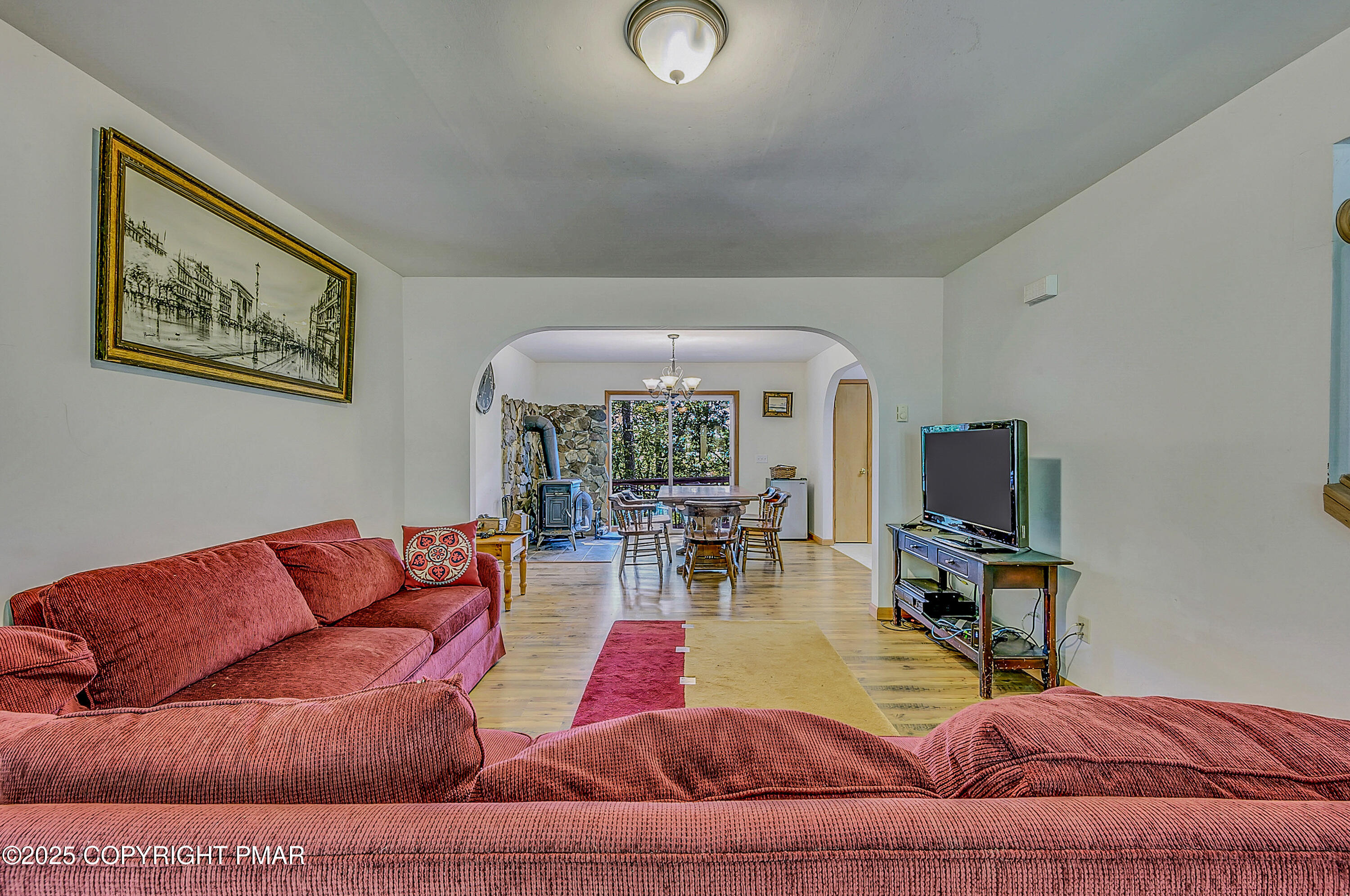 164 Bellingham Drive Bushkill, PA 18324 - Photo 4 of 46 a living room with furniture and a flat screen tv