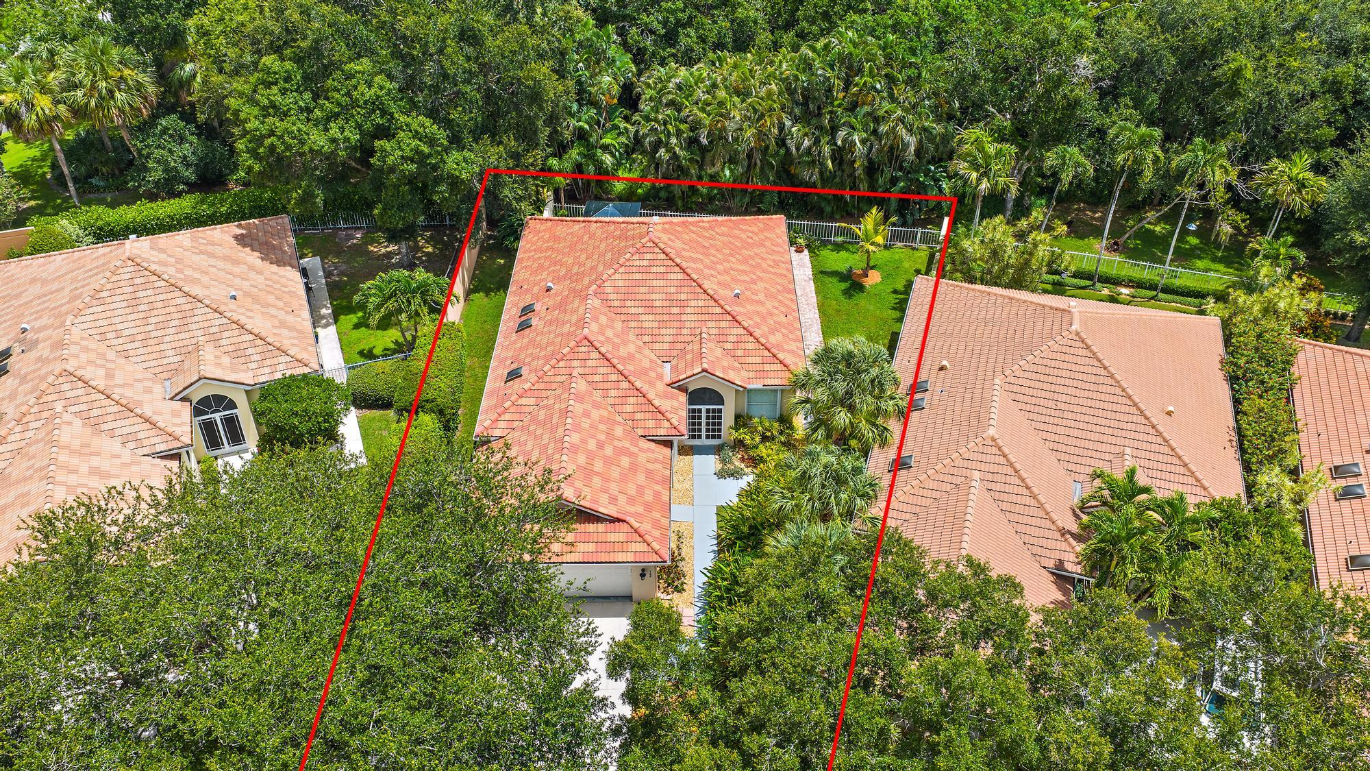 124 South Hampton Drive Jupiter, FL 33458 - Photo 37 of 39 an aerial view of house with yard and outdoor seating